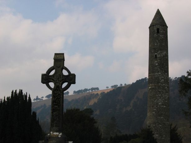 High Cross Glendalough with St Kevin's Round Tower